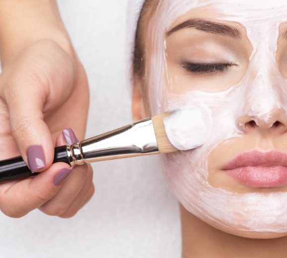 receiving-facial-mask-at-beauty-salon-1